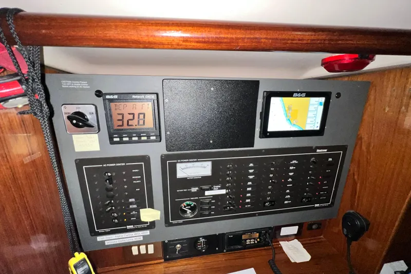 Slide: The Image of Control panel of a 1993 Beneteau Oceanis 440 sailboat with navigation instruments. - 44
