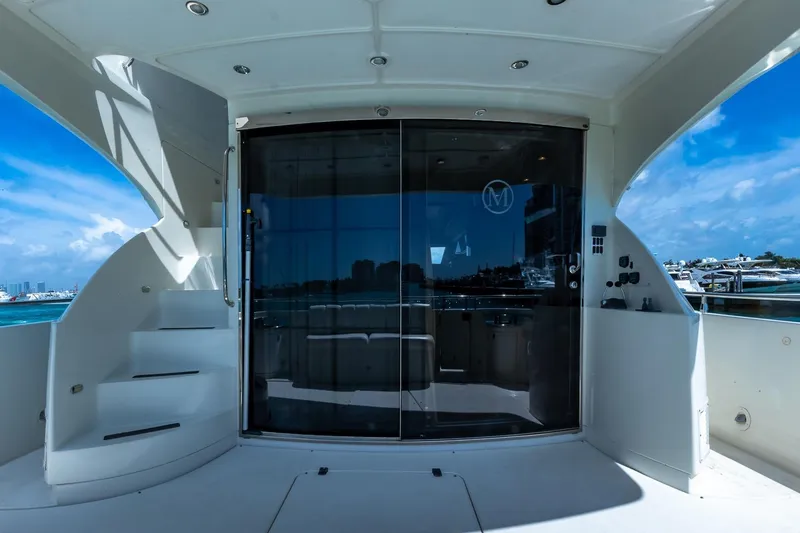 Slide: The Image of Luxurious 2005 Marquis 59 yacht interior with sleek design and ocean view. - 16