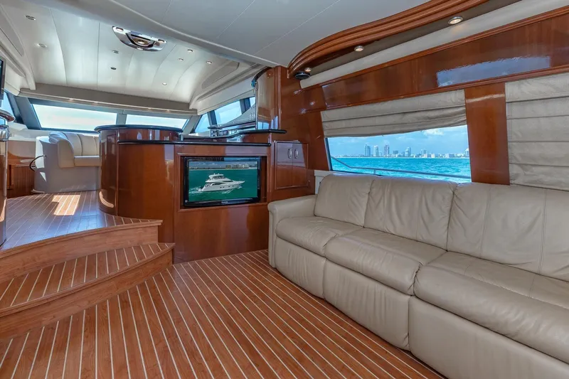 Slide: The Image of Luxurious 2005 Marquis 59 yacht interior with leather seating and panoramic ocean view. - 27