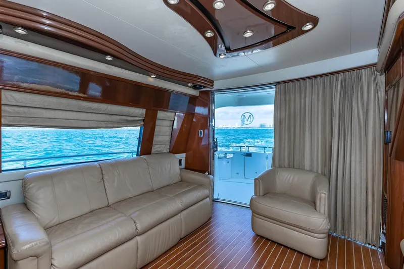 Slide: The Image of Luxurious interior of 2005 Marquis 59 yacht with leather seating and ocean view. - 29