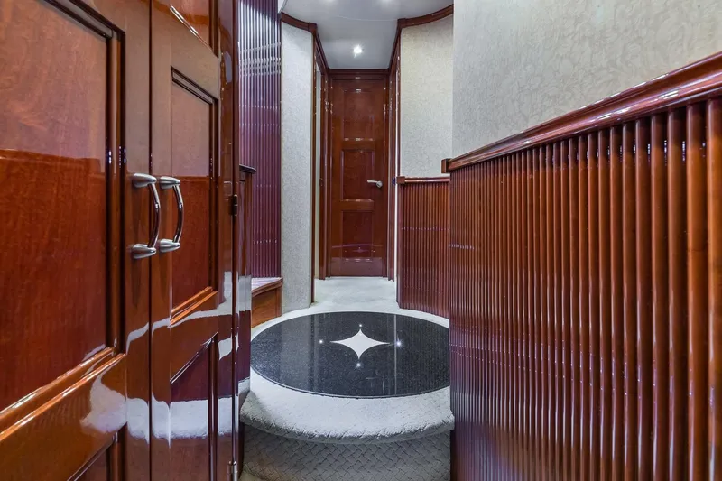 Slide: The Image of Luxurious wooden interior hallway of a 2005 Marquis 59 yacht. - 35