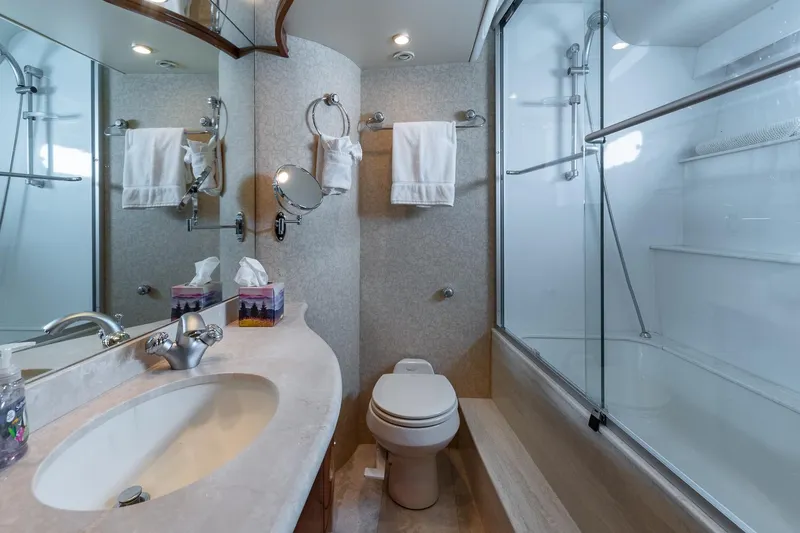 Slide: The Image of Luxurious 2005 Marquis 59 yacht bathroom with modern fixtures and elegant design. - 44