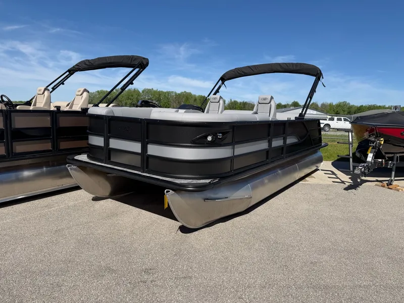 The Image of 2026 Bentley Pontoons Legacy 200 Swingback on parking lot. - 1