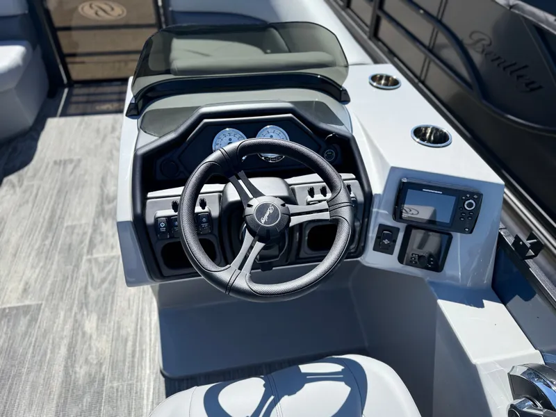 Slide: The Image of Interior view of 2026 Bentley Pontoons FISH 220 helm. - 10