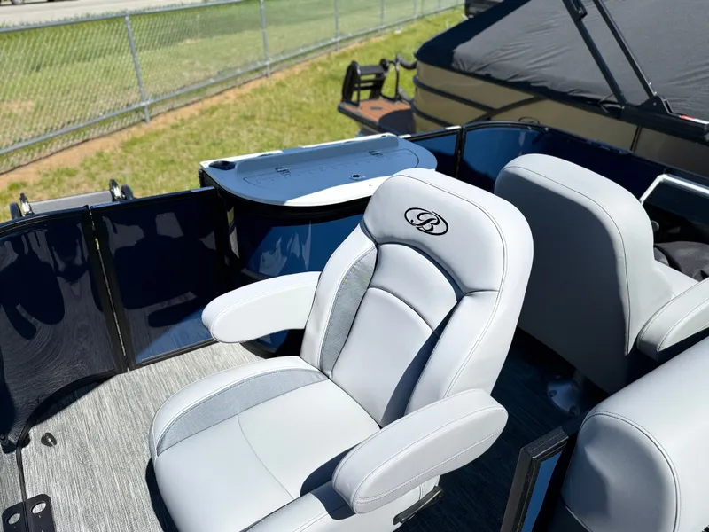 Slide: The Image of 2026 Bentley Pontoons FISH 220 interior with luxurious seating. - 7