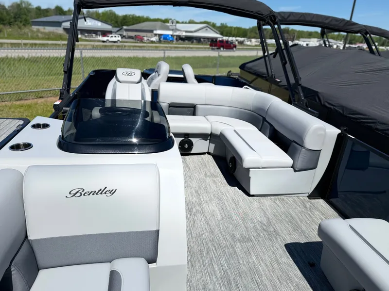 Slide: The Image of 2026 Bentley Pontoons FISH 220 with luxurious interior and seating. - 8