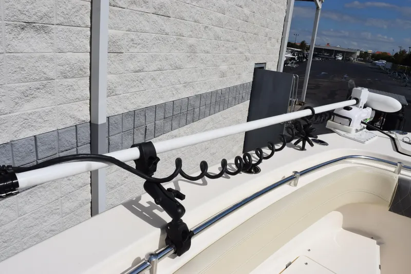 Slide: The Image of 2022 Cobia 280 Center Console boat with mounted equipment on deck. - 19