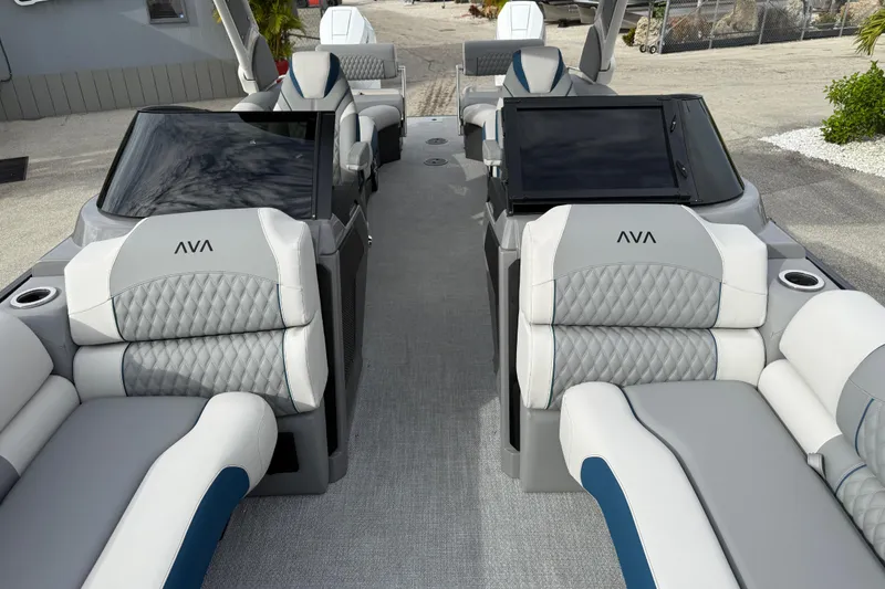 Slide: The Image of Luxurious 2026 Avalon 2785 Excalibur LTD boat interior with plush seating and modern design. - 18