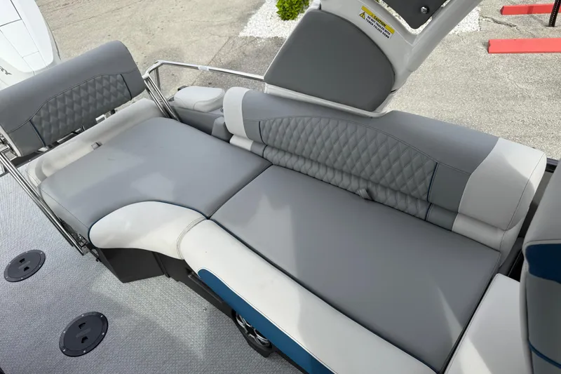 Slide: The Image of Luxurious seating on 2026 Avalon 2785 Excalibur LTD boat, featuring plush gray upholstery. - 21