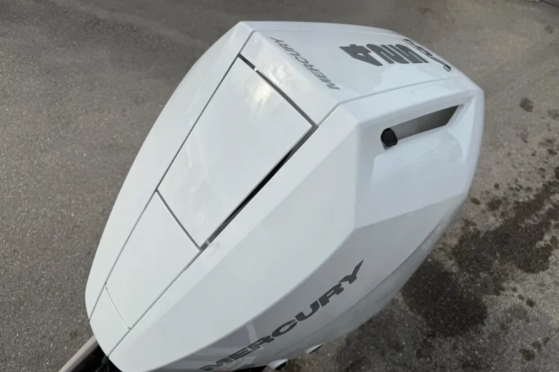 Slide: The Image of Close-up of a 2026 Mercury outboard motor on Avalon 2785 Excalibur LTD boat. - 23