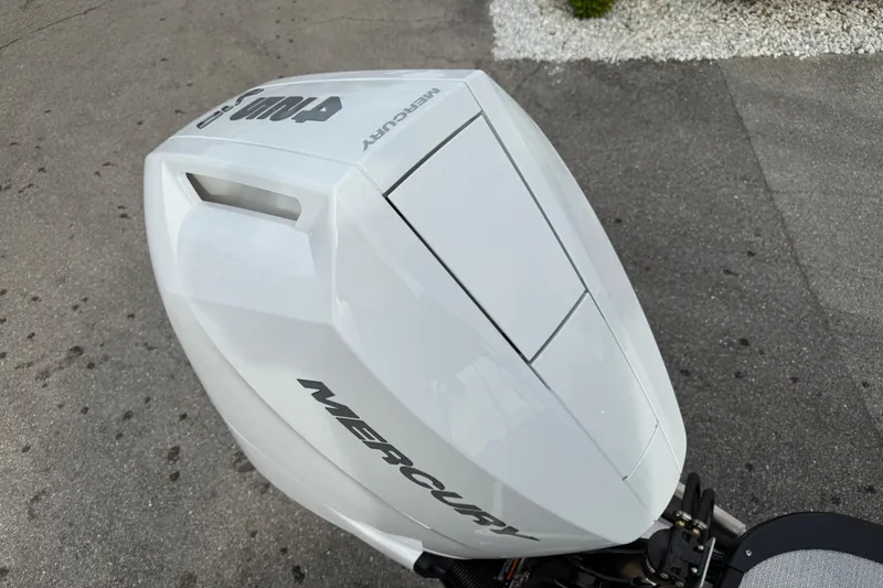 Slide: The Image of Close-up of a Mercury 425hp V-10 engine on a 2026 Avalon 2785 Excalibur LTD boat. - 24