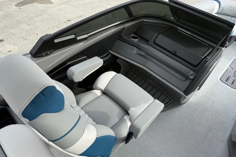 Slide: The Image of Luxurious seating on 2026 Avalon 2785 Excalibur LTD Windshield Quad Lounger boat interior. - 25