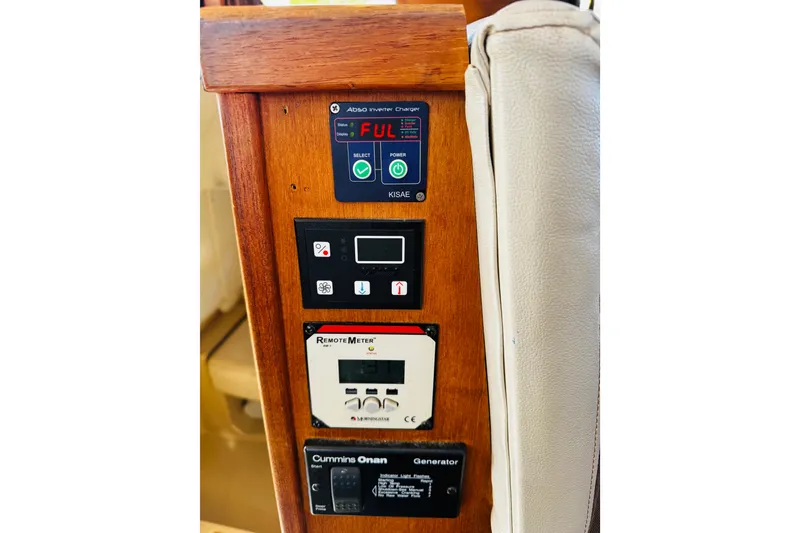 Slide: The Image of Control panel of a 2012 Ranger Tugs R-31 boat with various electronic displays. - 23