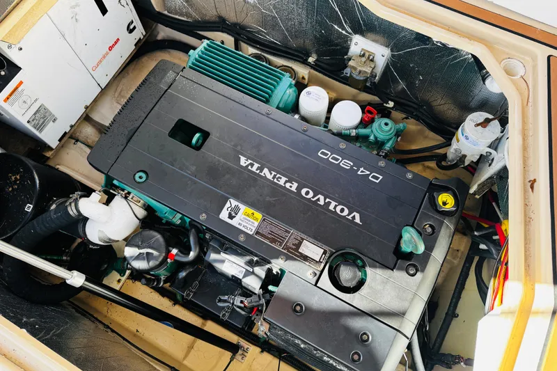 Slide: The Image of Volvo Penta engine in 2012 Ranger Tugs R-31 boat, showcasing Cummins Onan generator. - 37