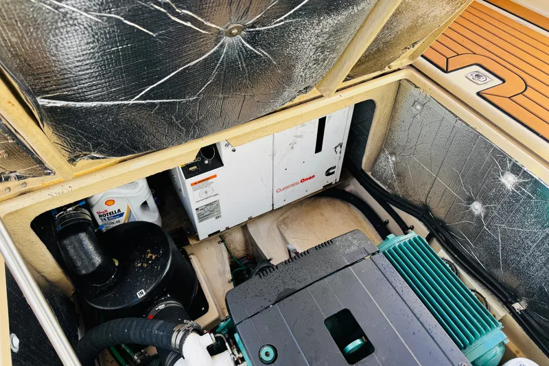 Slide: The Image of Engine compartment of a 2012 Ranger Tugs R-31 with Cummins Onan generator. - 39