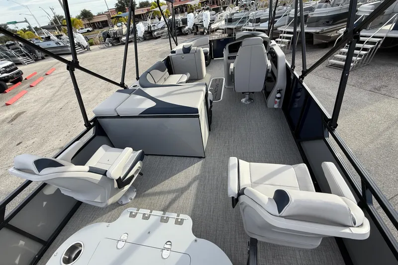 Slide: The Image of 2026 Avalon 2385 LSZ Rear Fish Tri Toon boat interior with seating and helm, high performance design. - 14