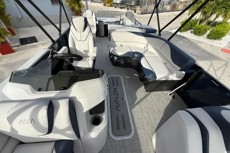 Slide: The Image of 2026 Avalon 2385 LSZ Rear Fish Tri Toon boat interior with luxurious seating and modern design. - 21