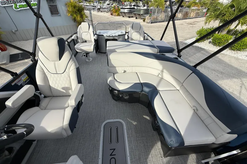Slide: The Image of 2026 Avalon 2385 LSZ Rear Fish Tri Toon interior with luxurious seating and high-performance design. - 22