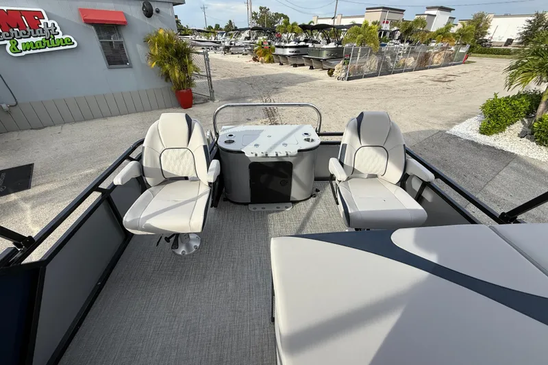 Slide: The Image of 2026 Avalon 2385 LSZ Rear Fish Tri Toon boat interior with seating and fishing station. - 23