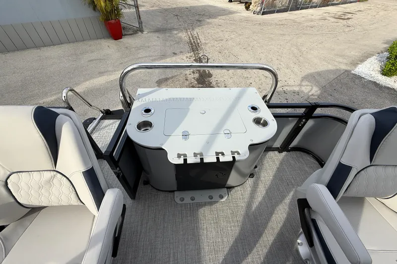 Slide: The Image of 2026 Avalon 2385 LSZ Rear Fish Tri Toon boat interior with seating and fishing station. - 24