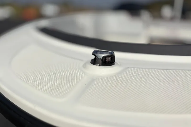 Slide: The Image of Close-up of 2022 Bayliner Element M15 boat detail, featuring a sleek design element. - 18