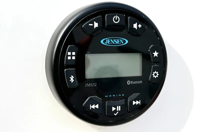 Slide: The Image of Jensen marine audio system on 2022 Bayliner Element M15 boat, featuring Bluetooth connectivity. - 31