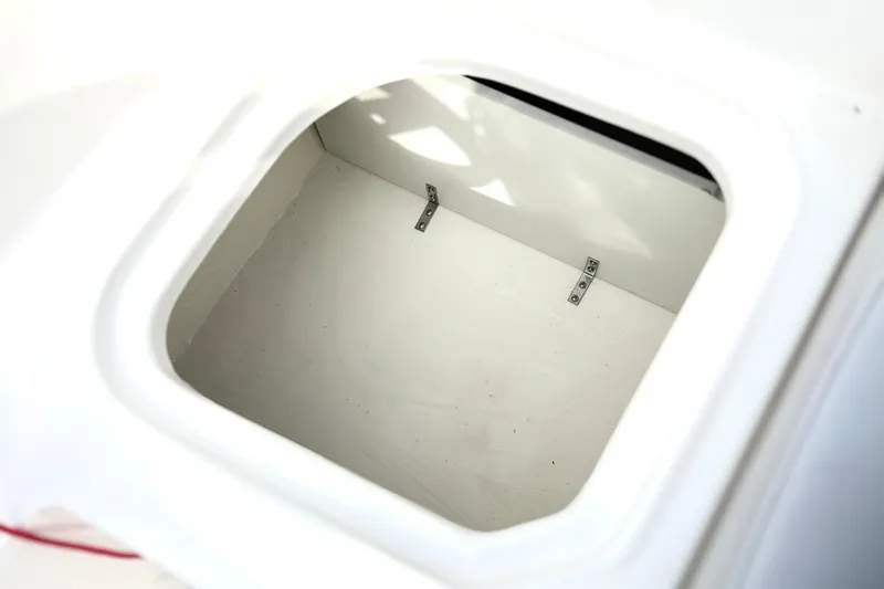Slide: The Image of Storage compartment of 2022 Bayliner Element M15 boat, open and empty. - 35