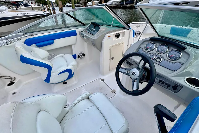 Slide: The Image of Manufacturer Provided Image: 2018 Chaparral 21 H2O Sport boat interior, top view, white and gray seating. - 3