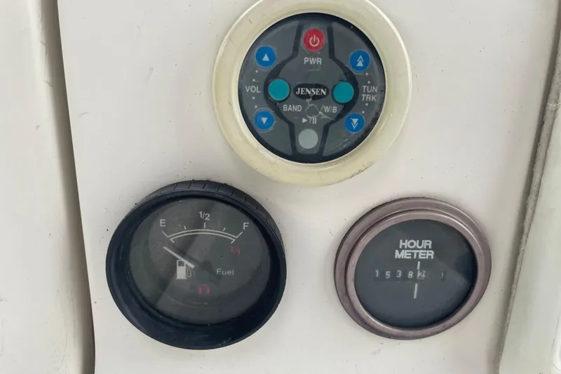 Slide: The Image of Control panel of a 1989 Hunter 35.5 boat with fuel gauge and hour meter. - 11