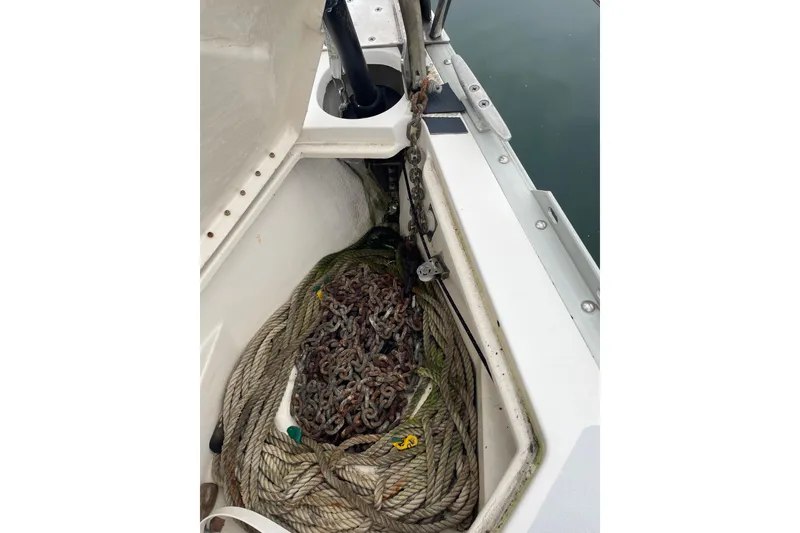 Slide: The Image of Anchor chain and rope storage on a 1989 Hunter 35.5 sailboat. - 8