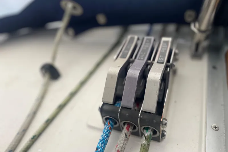 Slide: The Image of Close-up of sailboat rope clutches on a 1989 Hunter 35.5 model. - 9