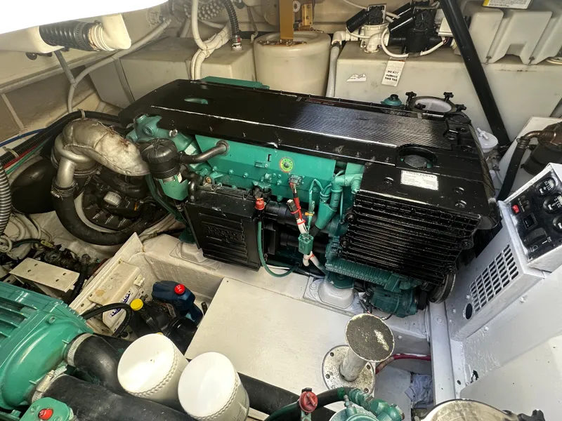 Slide: The Image of Engine room of a 2006 Tiara Yachts Sovran, featuring a Volvo Penta engine. - 29