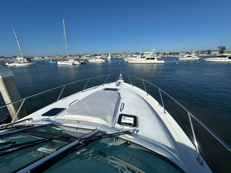 Slide: The Image of Bow view of 2006 Tiara Yachts Sovran in a busy marina. - 37