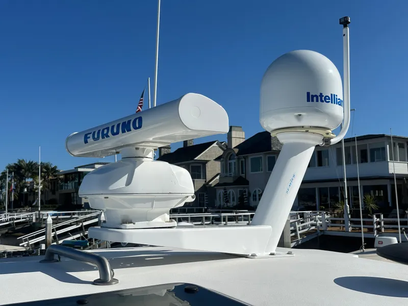 Slide: The Image of Radar and satellite equipment on a 2006 Tiara Yachts Sovran, featuring Furuno and Intellian systems. - 38