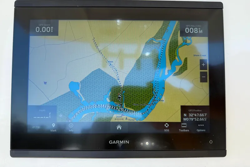 Slide: The Image of Garmin GPS display on 2023 Cobia 240CC showing Shem Creek navigation map. - 16