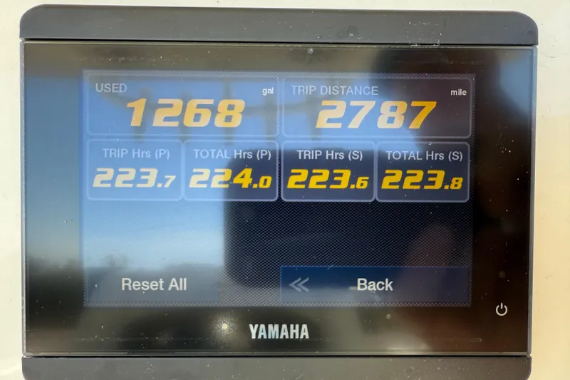 Slide: The Image of Yamaha display showing fuel usage and trip data for 2023 Cobia 240CC boat. - 17