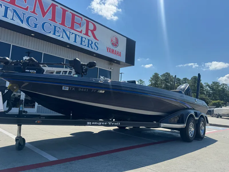 Slide: The Image of 2019 Ranger Z520L boat on trailer at Premier Boating Centers, sunny day. - 9