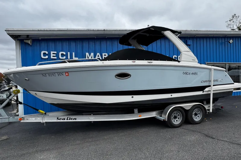 The Image of 2020 Chaparral 277 SSX boat on trailer at Cecil Marine dealership. - 1