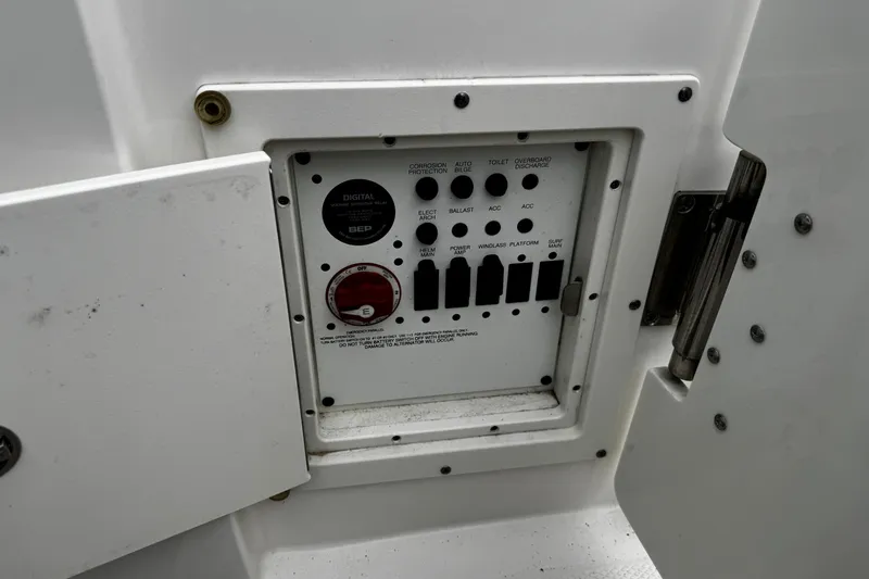 Slide: The Image of Control panel of a 2020 Chaparral 277 SSX boat with switches and indicators. - 15