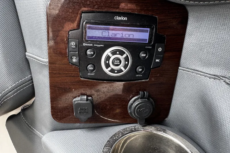 Slide: The Image of Clarion audio system in 2020 Chaparral 277 SSX boat, featuring Bluetooth connectivity. - 19