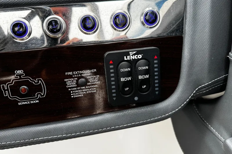 Slide: The Image of Control panel of 2020 Chaparral 277 SSX boat with Lenco trim tab switches. - 21