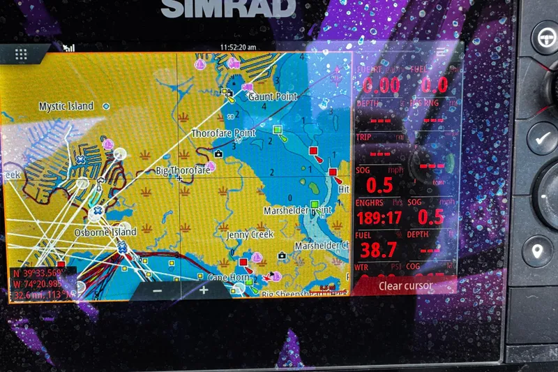 Slide: The Image of Simrad navigation display on 2020 Chaparral 277 SSX, showing map and trip data. - 23