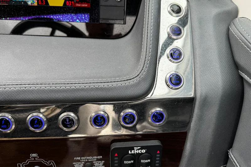 Slide: The Image of Control panel of 2020 Chaparral 277 SSX boat with illuminated buttons and display. - 34