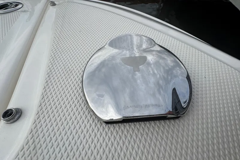 Slide: The Image of Chrome detail on 2015 Sea Ray 220 Sundeck Outboard boat deck. - 33