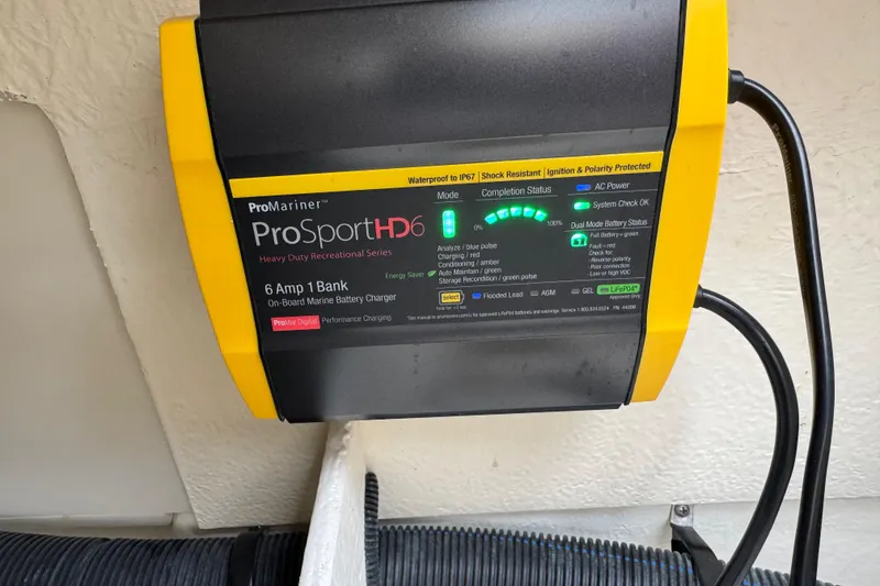 Slide: The Image of ProMariner ProSport HD6 marine battery charger installed on a 2015 Sea Ray 220 Sundeck Outboard. - 35