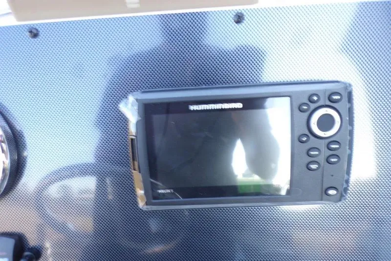 Slide: The Image of Dashboard of 2026 Xpress H20B Bay boat with electronic display. - 18