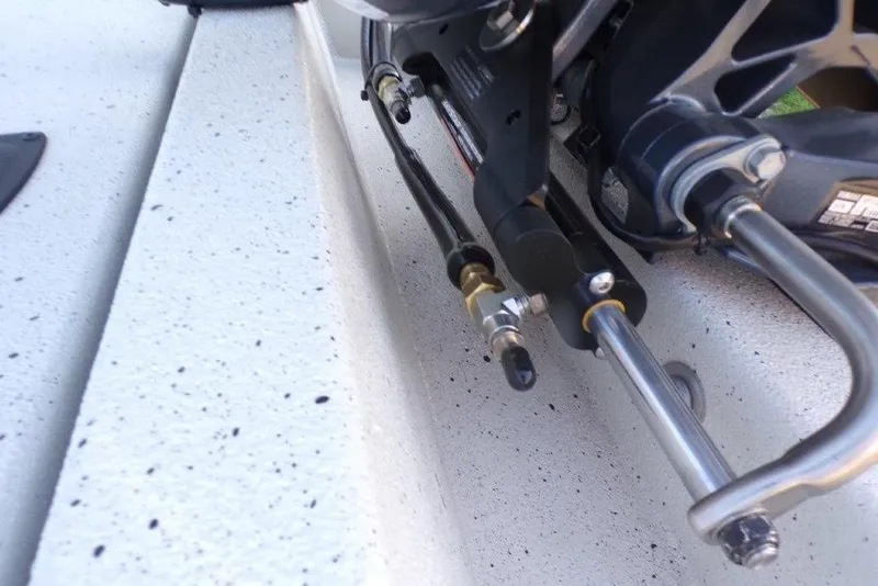 Slide: The Image of Close-up of 2026 Xpress H20B Bay boat's steering mechanism and hydraulic components. - 7