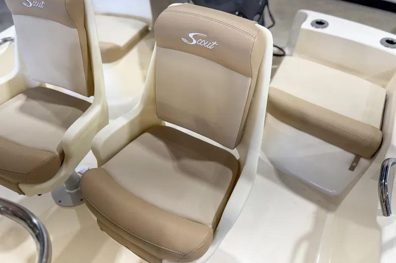 Slide: The Image of 2026 Scout 175 Sportfish boat seats in beige and cream upholstery. - 29