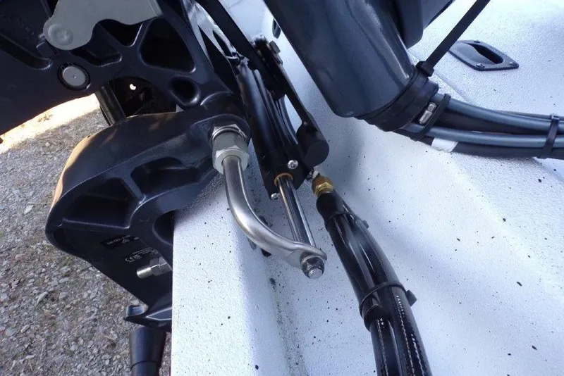 Slide: The Image of Close-up of 2026 Xpress H20B Bay boat engine components and cables. - 3