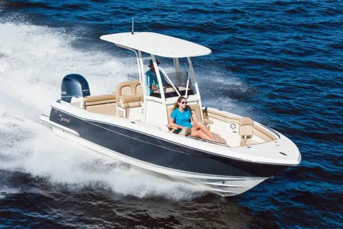 The Image of Manufacturer Provided Image: 2025 Scout 215 XSF boat cruising on open water, featuring sleek design and powerful engine. - 0